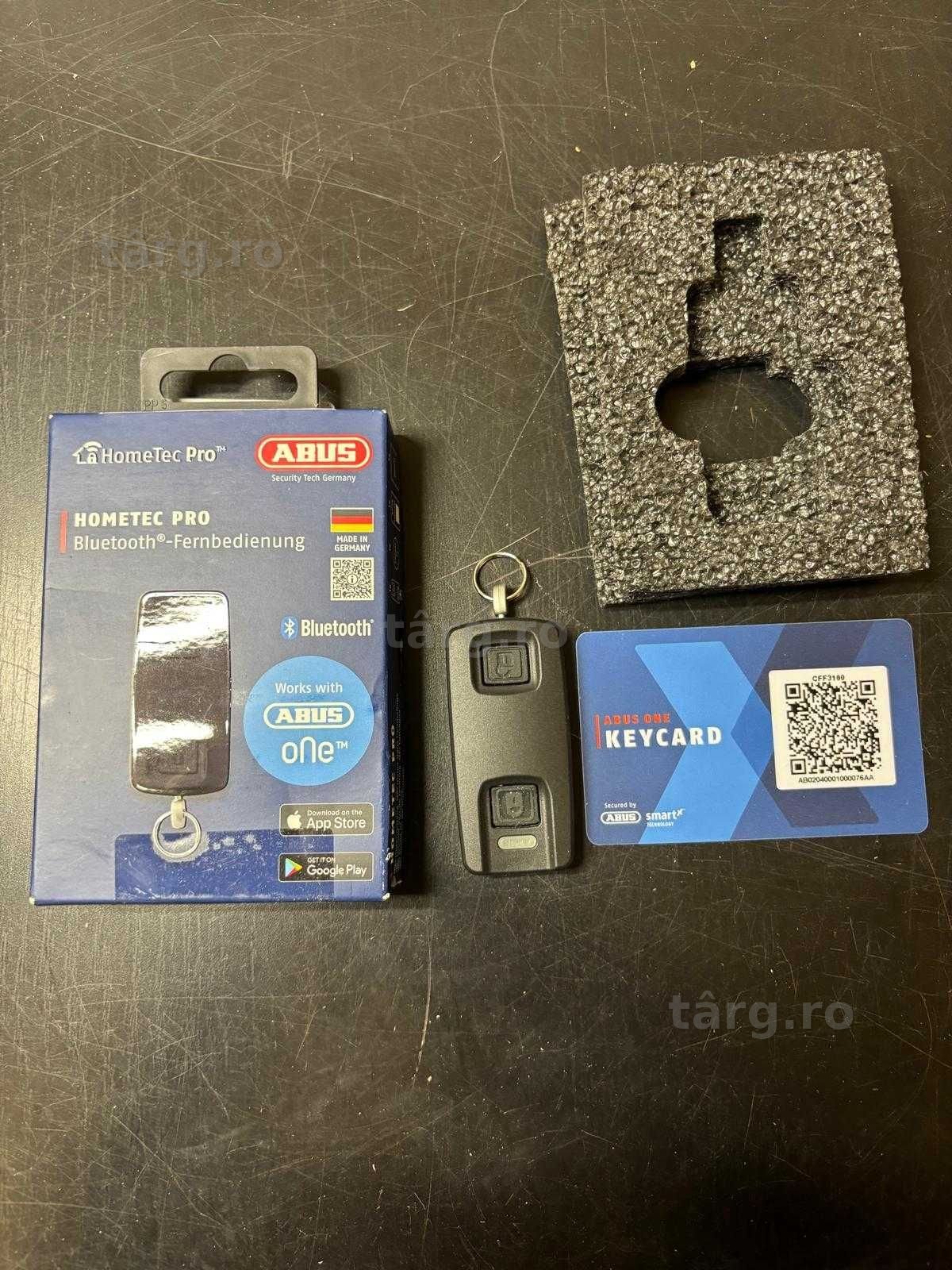 Telecomandă Bluetooth ABUS HomeTec Pro CFF3100 - pentru deschiderea ușii de la intrare - pe unitatea de blocare a ușii Bluetooth HomeTec Pro CFA3100