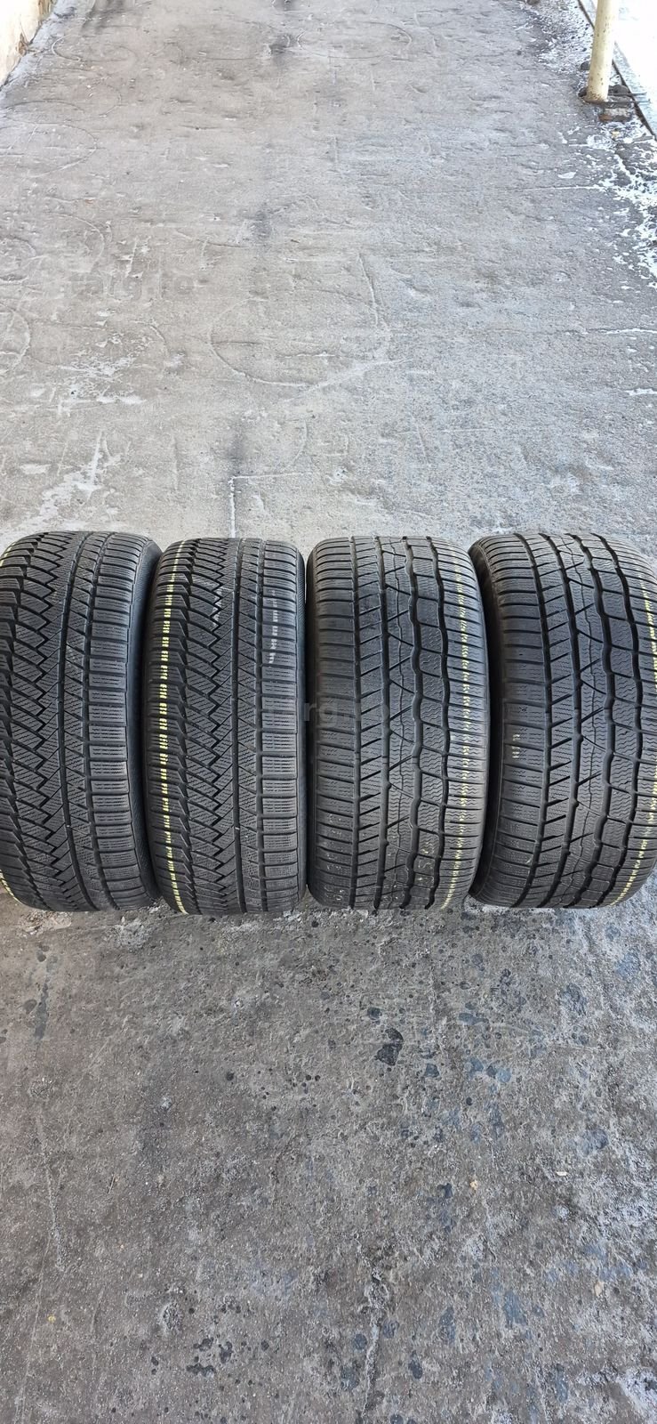 4 anvelope iarna Continental,fata 235/40/18,spate 265/35/18.Pret/buc.