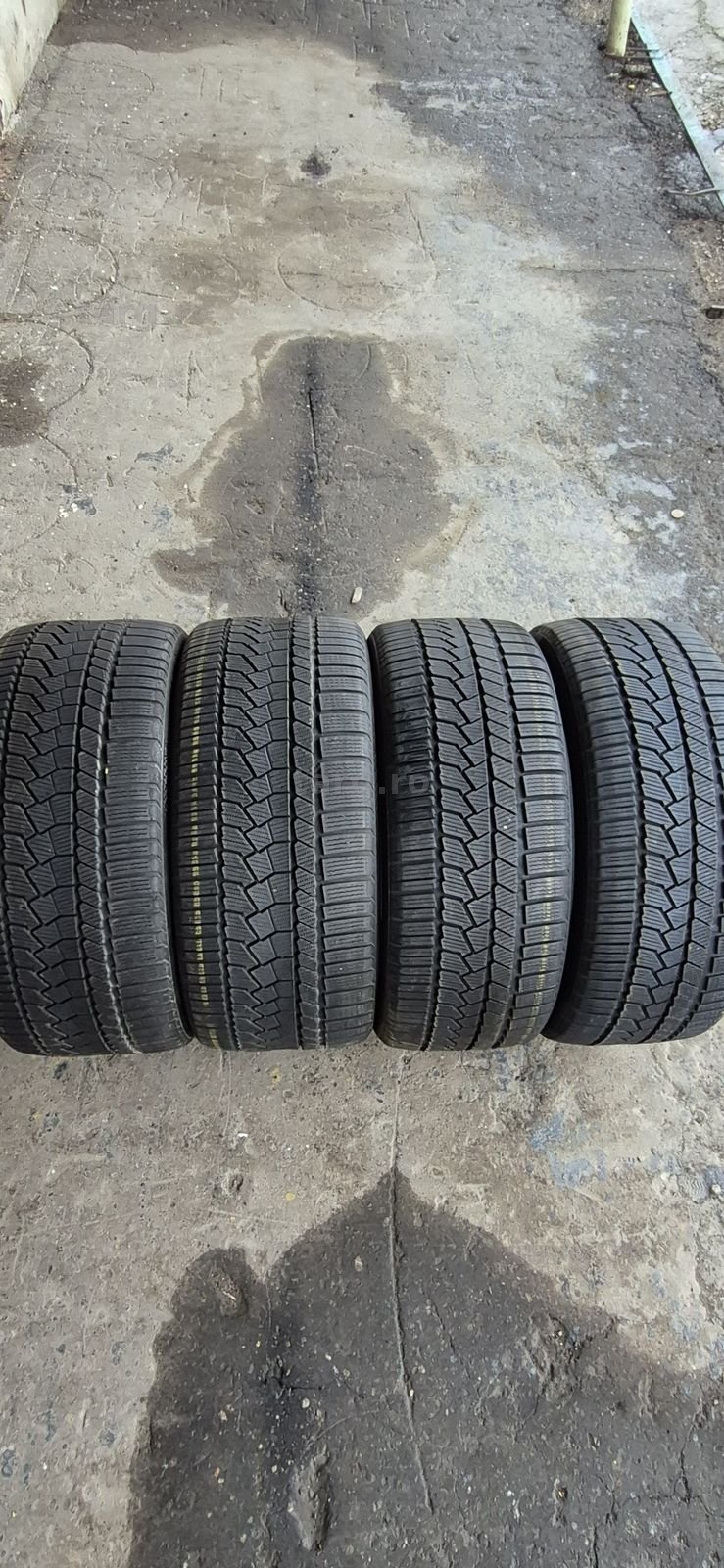 4 anvelope iarna Continental,fata 265/40/21,spate 295/35/21.Pret/buc.