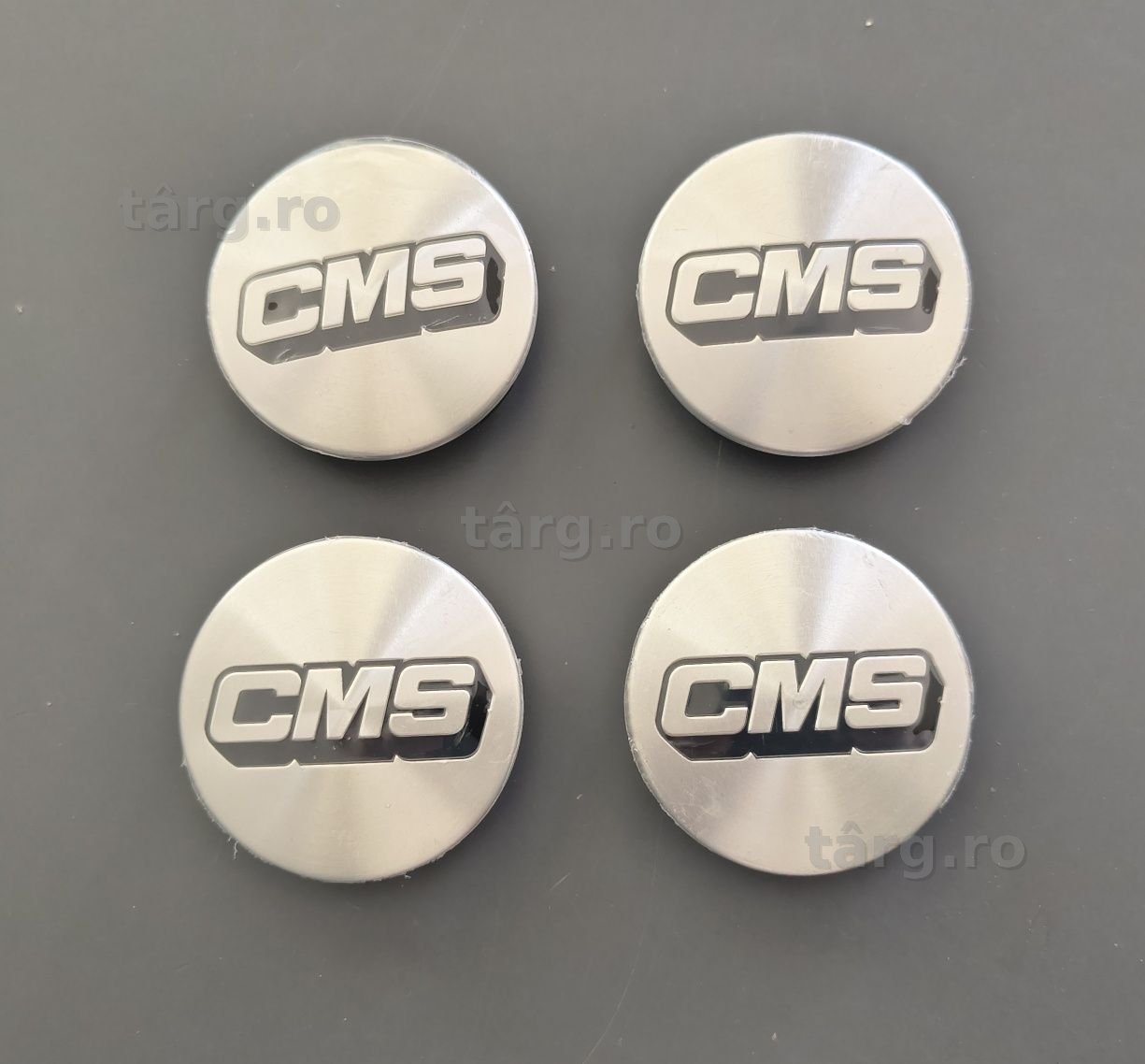 Capace jante CMS - 60 mm 
diametru 60 mm la emblema 
Originale CMS Made in Germany