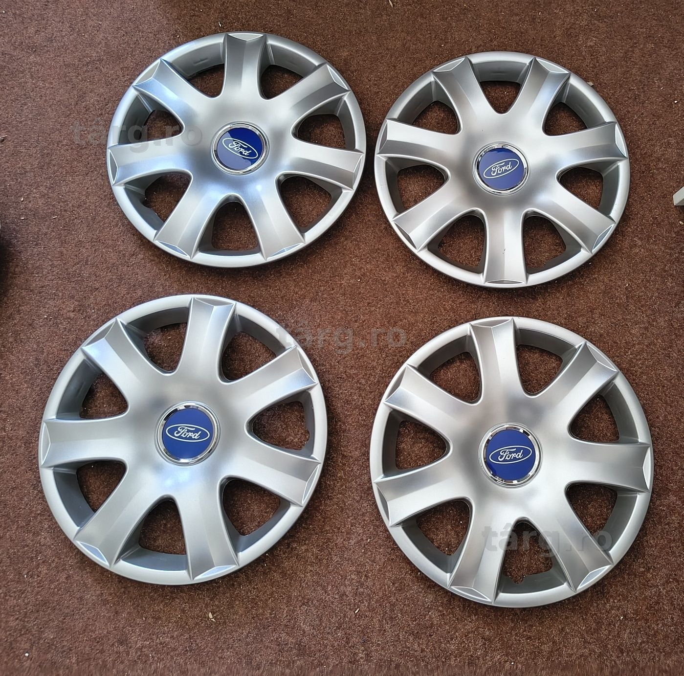 Capace jante roti R 14 Ford Focus Fiesta  Ka ..etc
Capacele sunt Noi .nefolosite